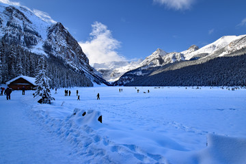 Lake Louise in winter a glacial lake frozen up covered with deep snow. Located in Banff NP Alberta...