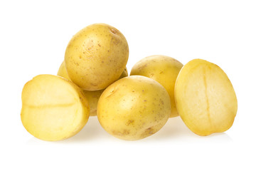 Heap of fresh young potatoes isolated on white background close up.