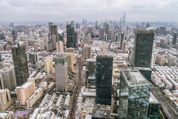 aerial view of downtown Shanghai near Jing An Temple and Nanjin Road after an unusual snowfall in the morning