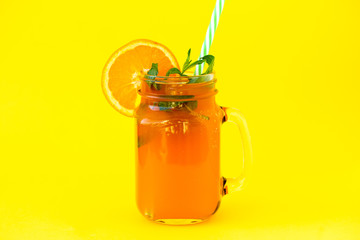 Fresh orange juice in the glass jar