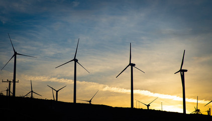 Fototapeta premium A group of wind turbines at Dawn