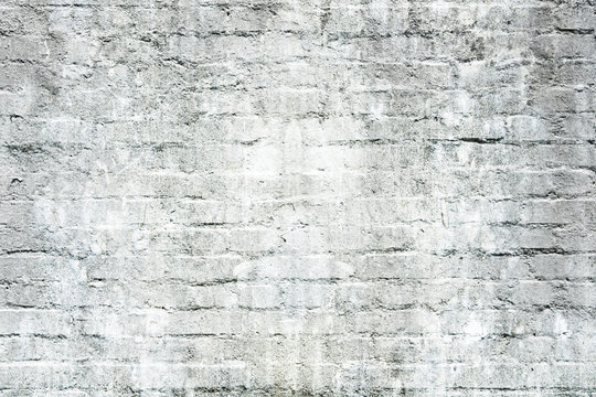 Old dirty white brick wall for texture or background.