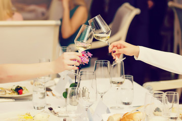 Celebration. People holding glasses of champagne making a toast