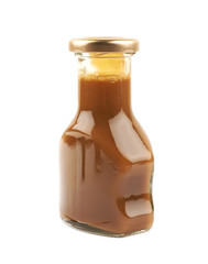 Bottle of caramel sauce isolated