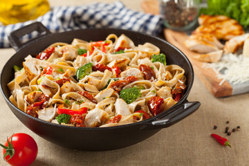 Whole-grain tagliatelle pasta with grilled chicken.
