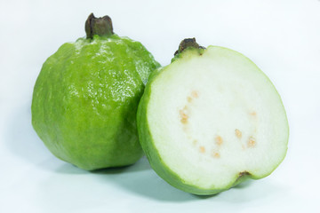 green ripe guava , half fresh organic guava fruits with shiny and shadow on white background
