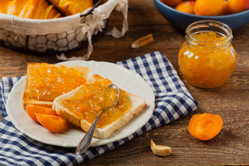 Breakfast. Toasts with cherry or peach jam and fresh fruit.
