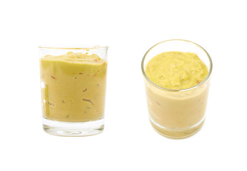 Glass shot of guacamole isolated