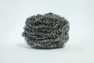 stainless steel wash cleaning . sponge scrubber for kitchenware on white background .