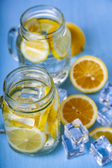 Refreshing ice cold water with lemon