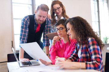 Picture of young architects discussing in office
