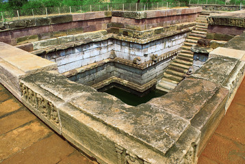 A pond in front of Hucchimalli Gudi Mad Malli's temple , Aihole, Bagalkot, Karnataka, India.