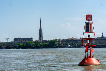 red navigation beacon in the Garonne river, France