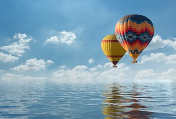 Fotobehang Ballon Kleurrijke heteluchtballon vliegt over de blauwe zee