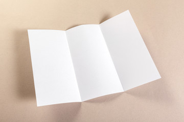 Blank paper pieces for mock up on a beige background