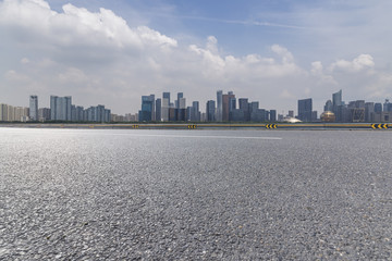 Panoramic skyline and modern business office buildings with empty road,empty concrete square floor