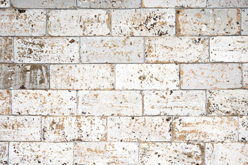 Old brick wall background. Grunge texture. Black wallpaper.