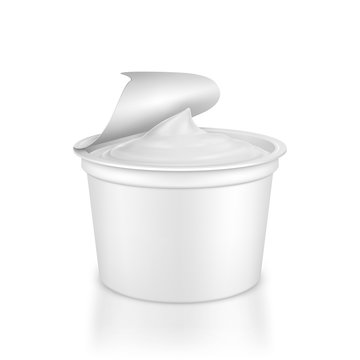 Open packing with yoghurt on a white background