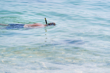 Fototapeta na wymiar Tourist was diving on the sea. Summer concept.