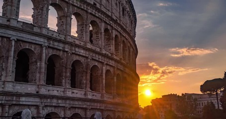 Rome Colosseum Sunrise on the Horizon. Colosseum Sunrise Landmark in City Center Timelapse 4K. - Powered by Adobe