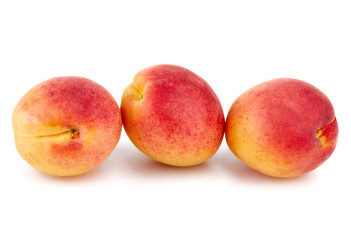 Isolated apricots. Fresh apricot fruit isolated on white background. Tropical abstract background. Fresh fruits. Place for your text.