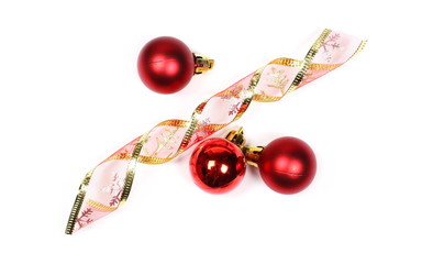 Christmas ornaments, decorated ribbon and red balls isolated on white background