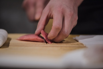 Handwork Slicing Fresh sea food, making sashimi