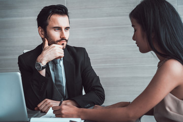 manager discussing work with his colleagues at meeting, business teamwork and partnership concept.  