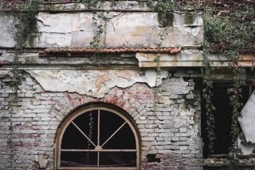broken window of abandoned old building
