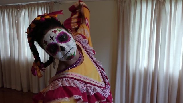 Mexican Hat Dance Day of the Dead face painting sugar skull