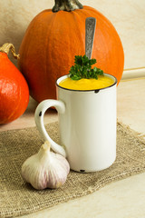 Pumpkin soup. Hot pumpkin soup with parsley and garlic.