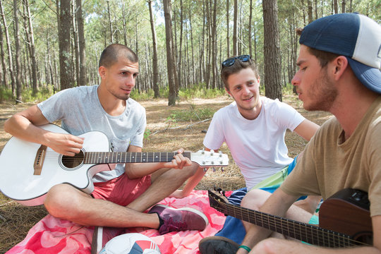 boys guitar and outdoor