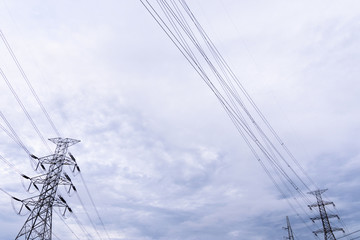 Electricity concept. Close up high voltage power lines station.