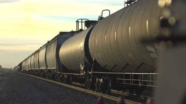 slow motion of train at sunset
