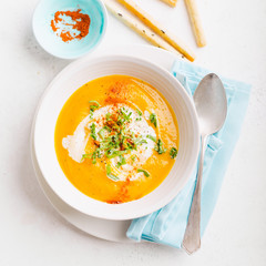 Pumpkin creamy soup in bowl