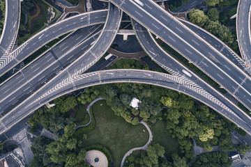 Aerial view of highway and overpass in city