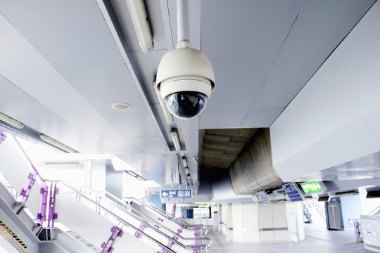 CCTV security camera operating in home. Image of CCTV security camera on background. CCTV ball on safe ground. 