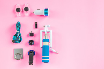 Accessory set technology on bright pink background