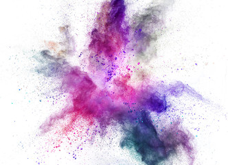 Colored powder explosion on white background.