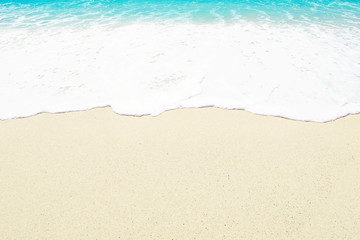Beautiful Tropical  beach with Soft wave of blue ocean, white sand and transparent sky. Summer travel holiday background concept. Sea panorama.