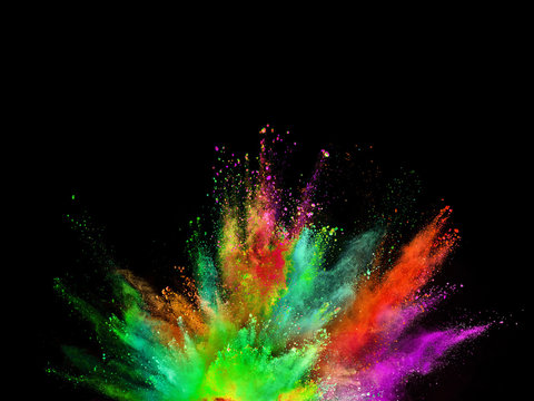 Colored powder explosion on black background. © Lukas Gojda