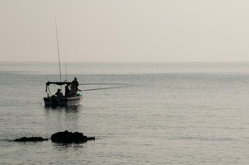  Fishermen on a boat in the sea