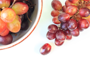 red grapes on white background