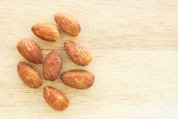 almonds nut roast on wooden background