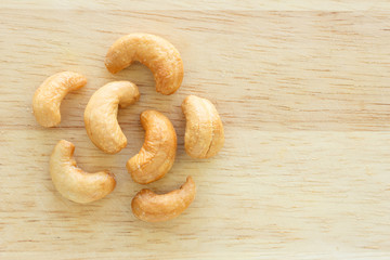 cashew nuts on wooden background
