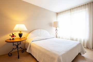 Fototapeta na wymiar Elegant bedroom in modern villa