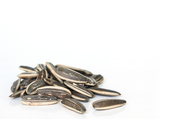 sunflower seeds for planting on white background
