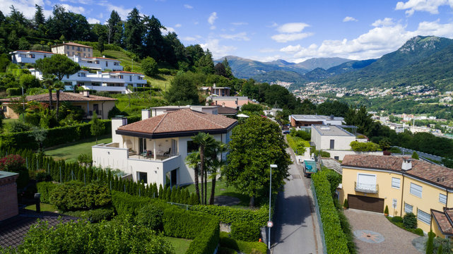 Aerial view of modern villa with large garden