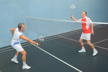 men playing badminton