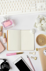 flat lay notebook and office accessories